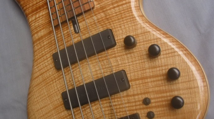 Bartolini 6 String Soapbars in Flame Maple Topped bass by Ristola Instruments