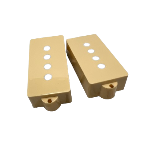 P Bass Pickup Covers in Cream showing the holes for the pole pieces 