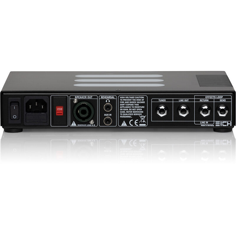 Photo of the back of the Eich T500 Bass Amplifier Head showing the tuner, line out, effects return and effects send as well as the speaker out, voltage settings and amp on/off buttone