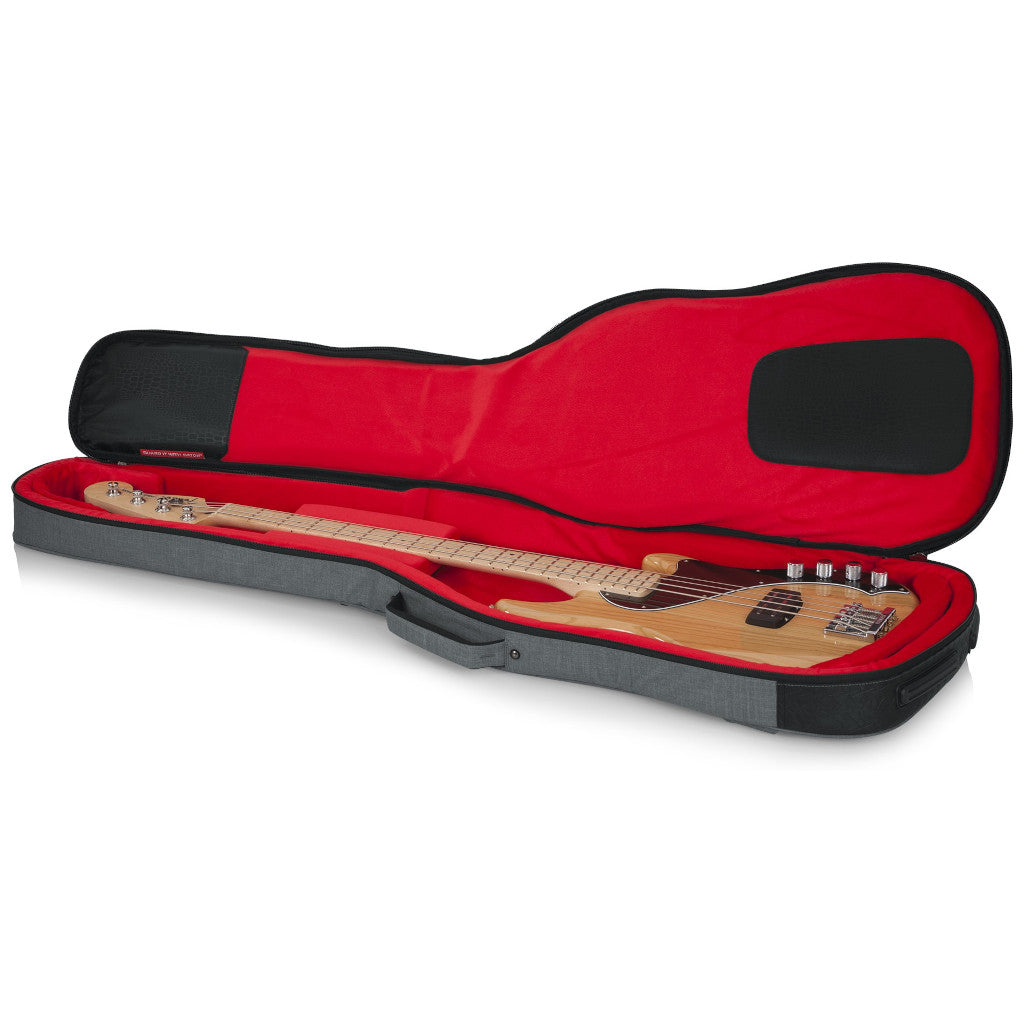 open case photo of the Gator Transit Series Bass Guitar Gig Bag showing red lining and bass placed in case