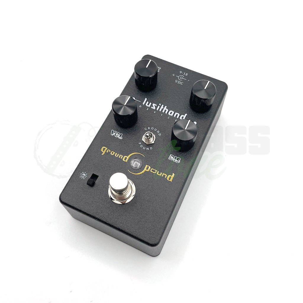 front side view of the Lusithand Ground &amp; Pound Bass Distortion Pedal Mark II showing the LED light and footswitch button