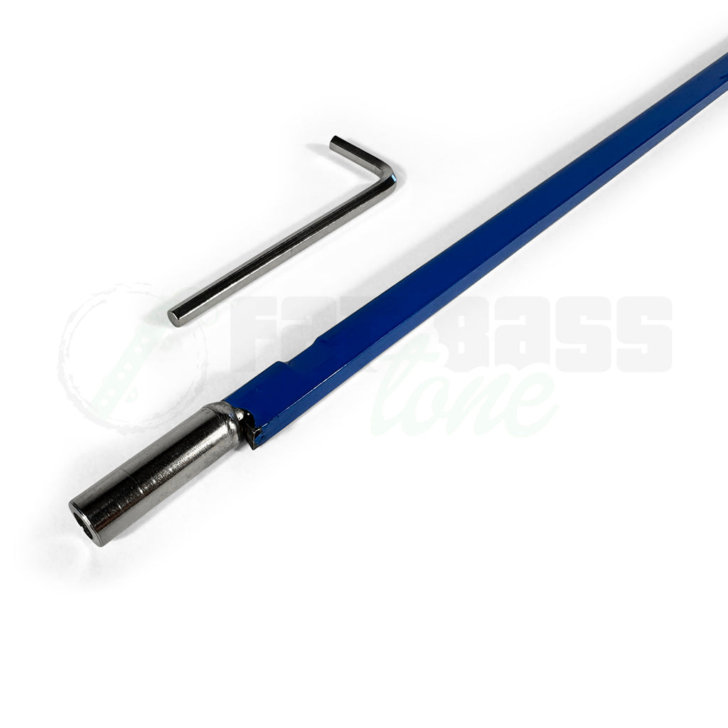 view of the nut of the truss rod. This is a round metal object under 1" long