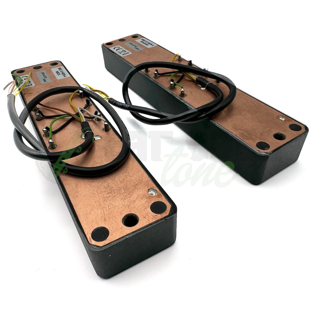 Side angle view of the back of the Delano SBC8 HE/S-4 8 String Quad-Coil Bass Pickups showing the small connection posts that the wires are connected to