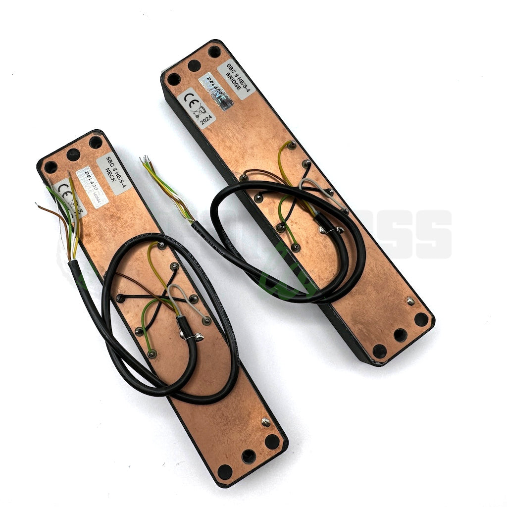 back overhead view of the Delano SBC8 HE/S-4 8 String Quad-Coil Bass Pickups showing the copper back place and the model name as well as the Delano holographic sticker