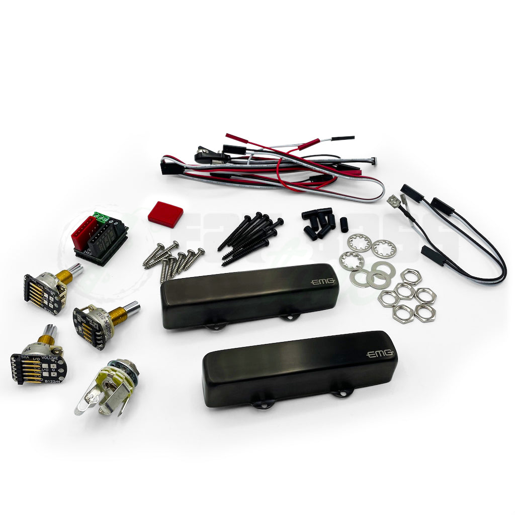 view of the EMG Robert Trujillo Riptide Jazz Bass Pickups with brushed black chrome covers in addition to all the items which EMG includes with the pickups, such as jack, pots, screws, solder less connection cables, nuts, washers and heat shrink.