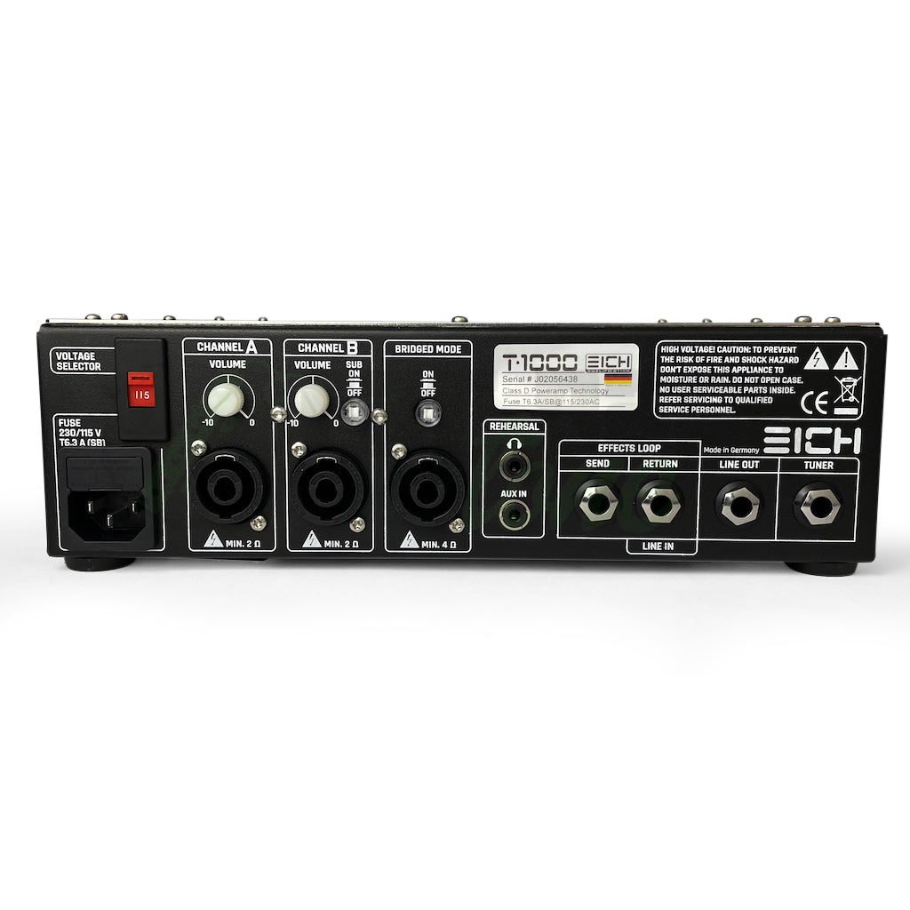 back view of the Eich T1000 Bass Amplifier Head showing the outputs for both chanels, effects loop, line out, tuner out, power switch, and cord jack