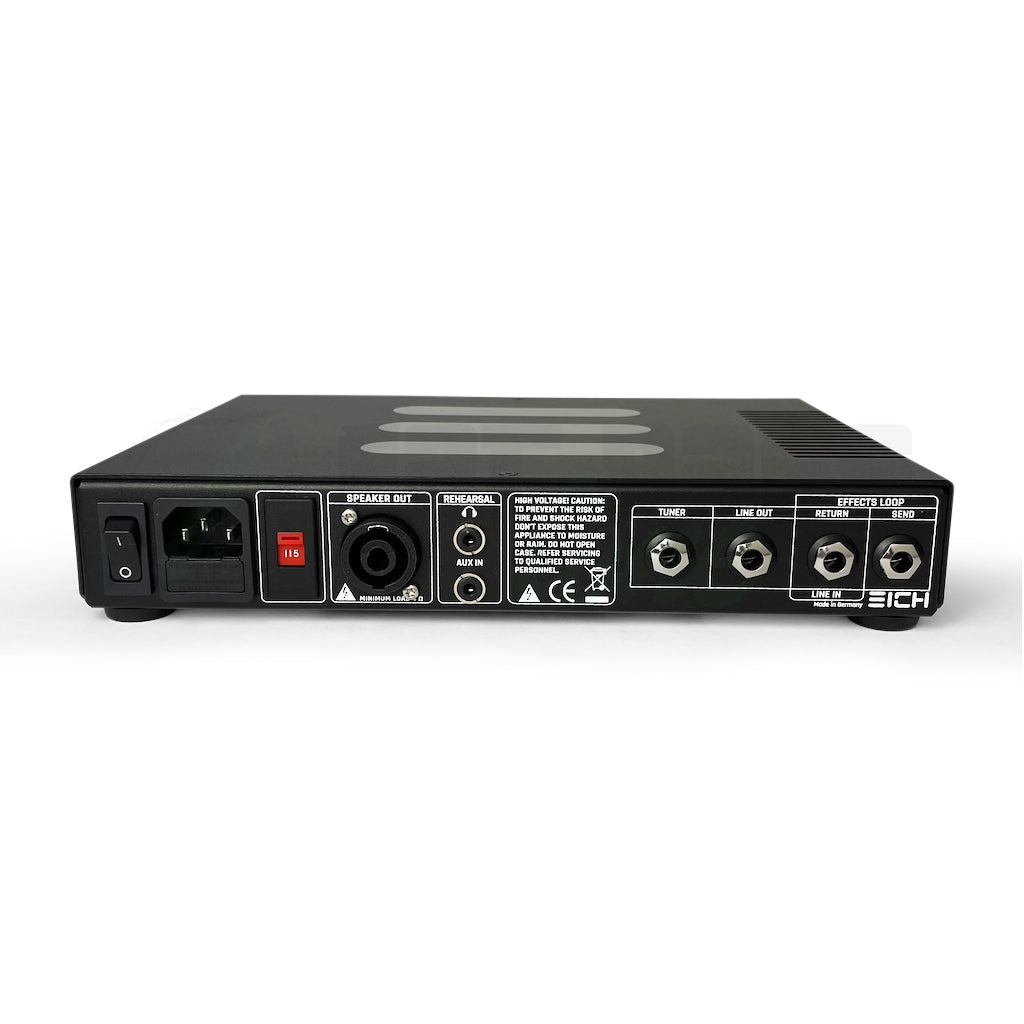 Photo of the back of the Eich T500 Bass Amplifier Head showing the tuner, line out, effects return and effects send as well as the speaker out, voltage settings and amp on/off buttone