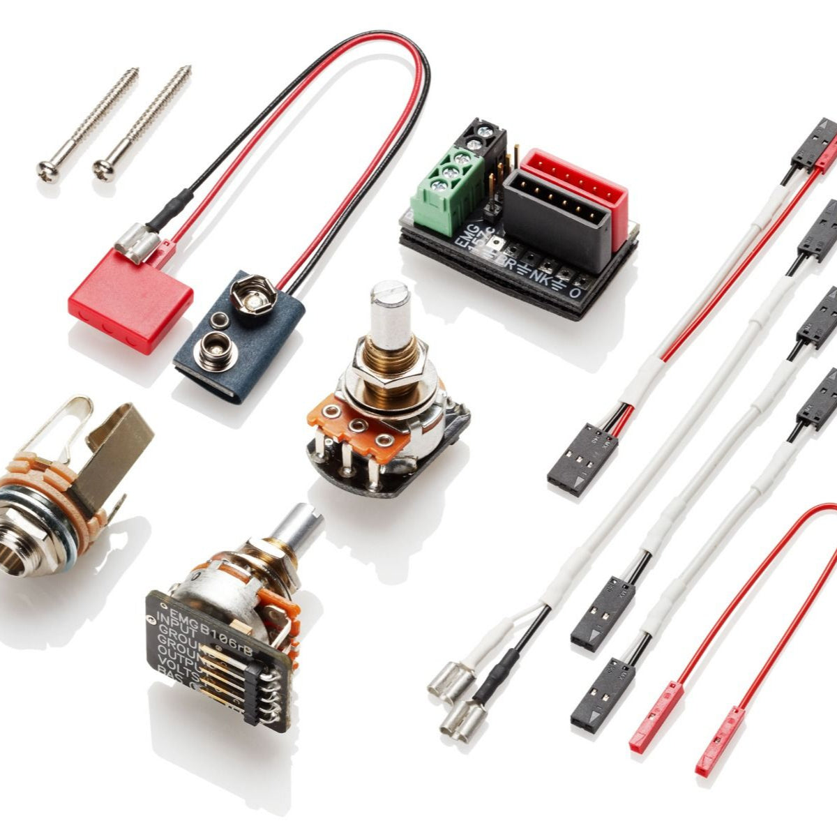 View of all included items with a single EMG E6W bass soapbar pickup, including pots, jack, and solderless connector cables.