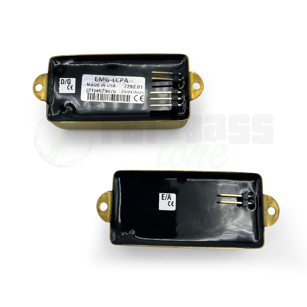 Overhead view of the back of the EMG Les Claypool LC 4 String Precision Bass® Pickups with the gold covers, showing the connection points on the back of the pickups.
