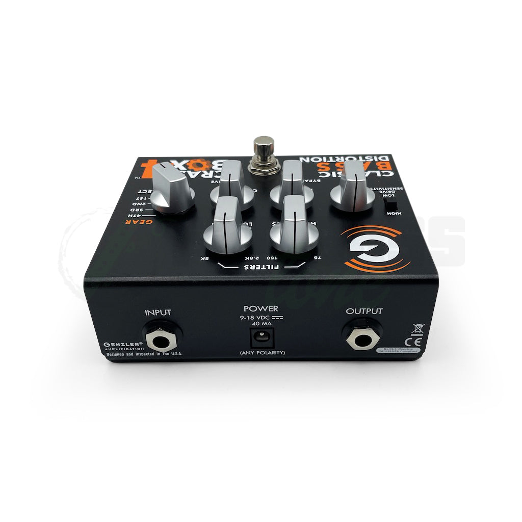 rear view of the Genzler Crash Box 4 Distortion Pedal showing all the control knobs and stomp switch, as well as the back panel with the input, output and power.