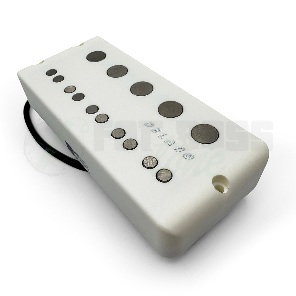 Photo of a white Delano Jay-Ray 5 Dual Coil Music Man® Bass Pickup in the Ernie Ball shape, showing the pole pieces