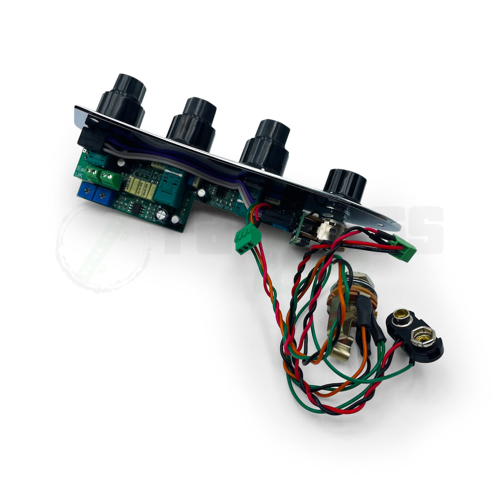 Side view of the John East J Retro Deluxe Preamp with Chrome Jazz Plate and Fender-Style Knobs, which shows the wires for the battery clip and jack.