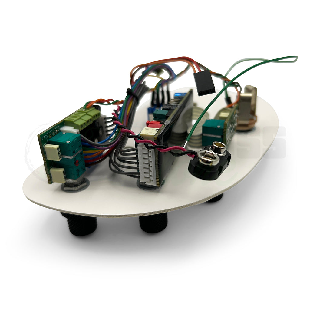 back view of the John East Uni-Pre 3 Band Bass Preamps showing the circuit board and battery clip