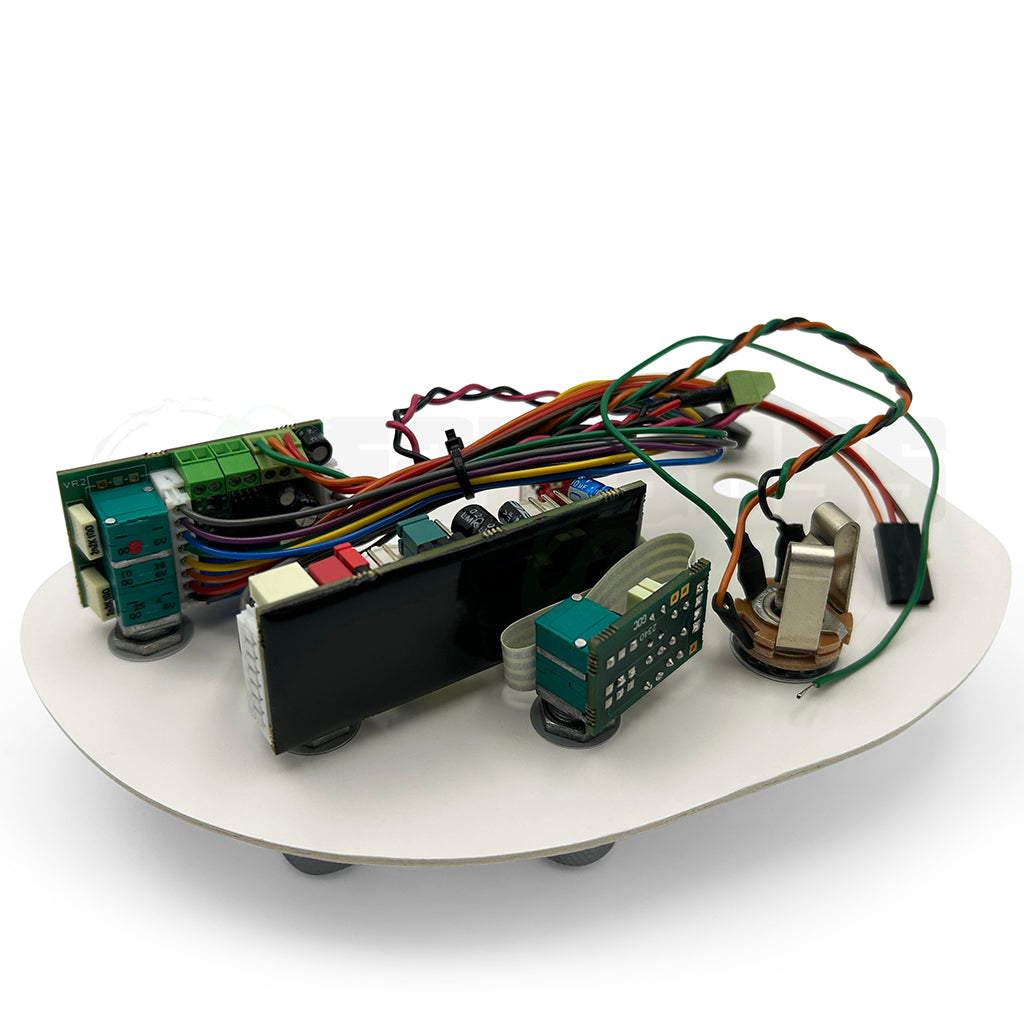 backside view of the John East Uni-Pre 3 Band Bass Preamps showing many colored wires connected to the PCB boards here the electronics are mounted