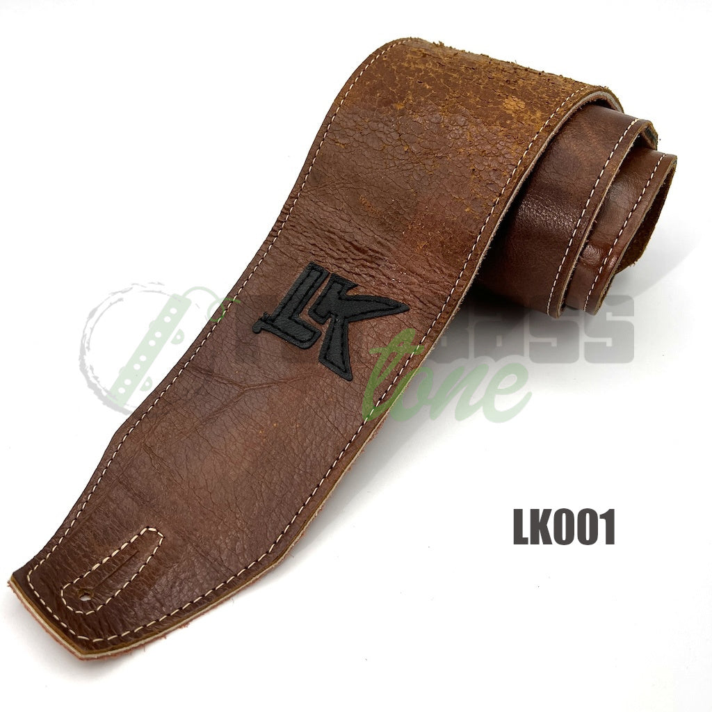 photo of LK Straps Leather Bass Strap in medium brown color with a black logo