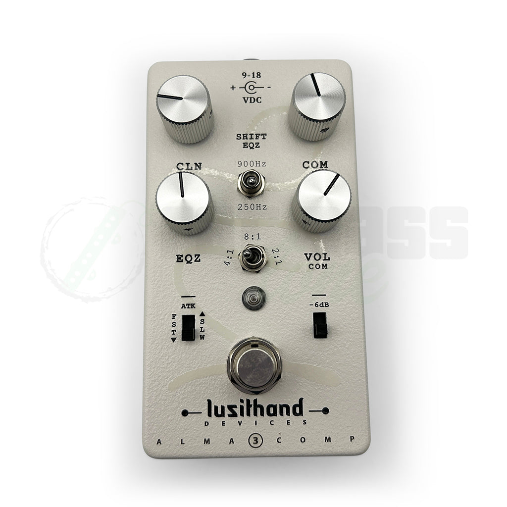 to view of the pedal showing the textured cream finish, knobs, and switches