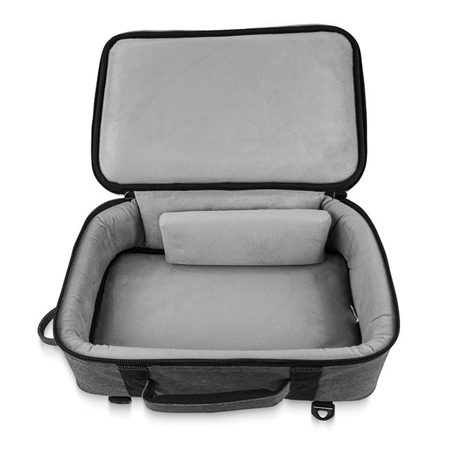 Overhead view of the Trickfish Bullhead Bass Amplifier Carrying Bag while it is fully unzipped, showing the space for the amp, as well as an extra cushion to fill any gaps.