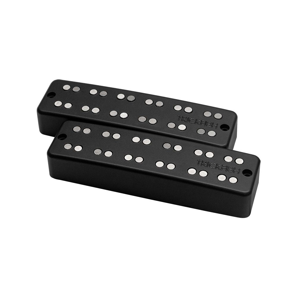 photo of the Trickfish 6 String Dual Coil Bass Pickups with their exposed pole pieces and logo on the lower left